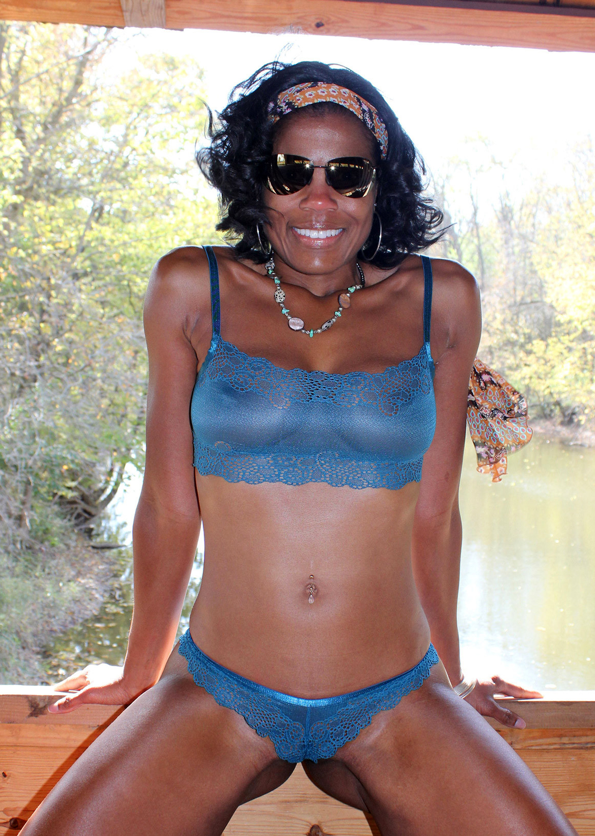 sexy woman in black underwear during a sexy striptease